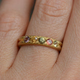 Handcrafted five stone sapphire ring band in 18k Fairmined gold, ethical jewellery and responsibly sourced materials.