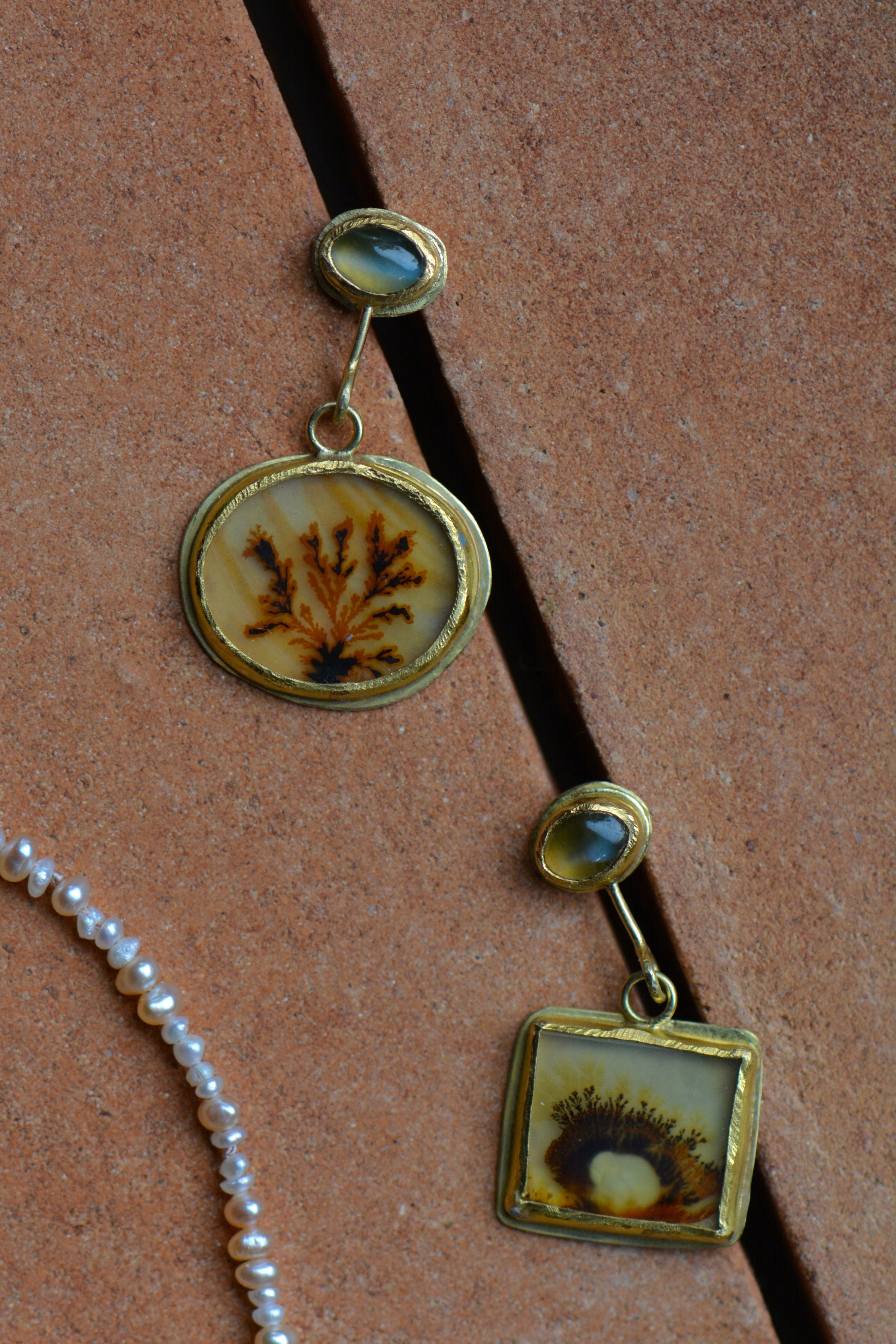 Dendritic agate and chrysoberyl earrings set in 18k and 22k yellow gold