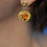 Dendritic agate & chrysoberyl oval drop earring on model