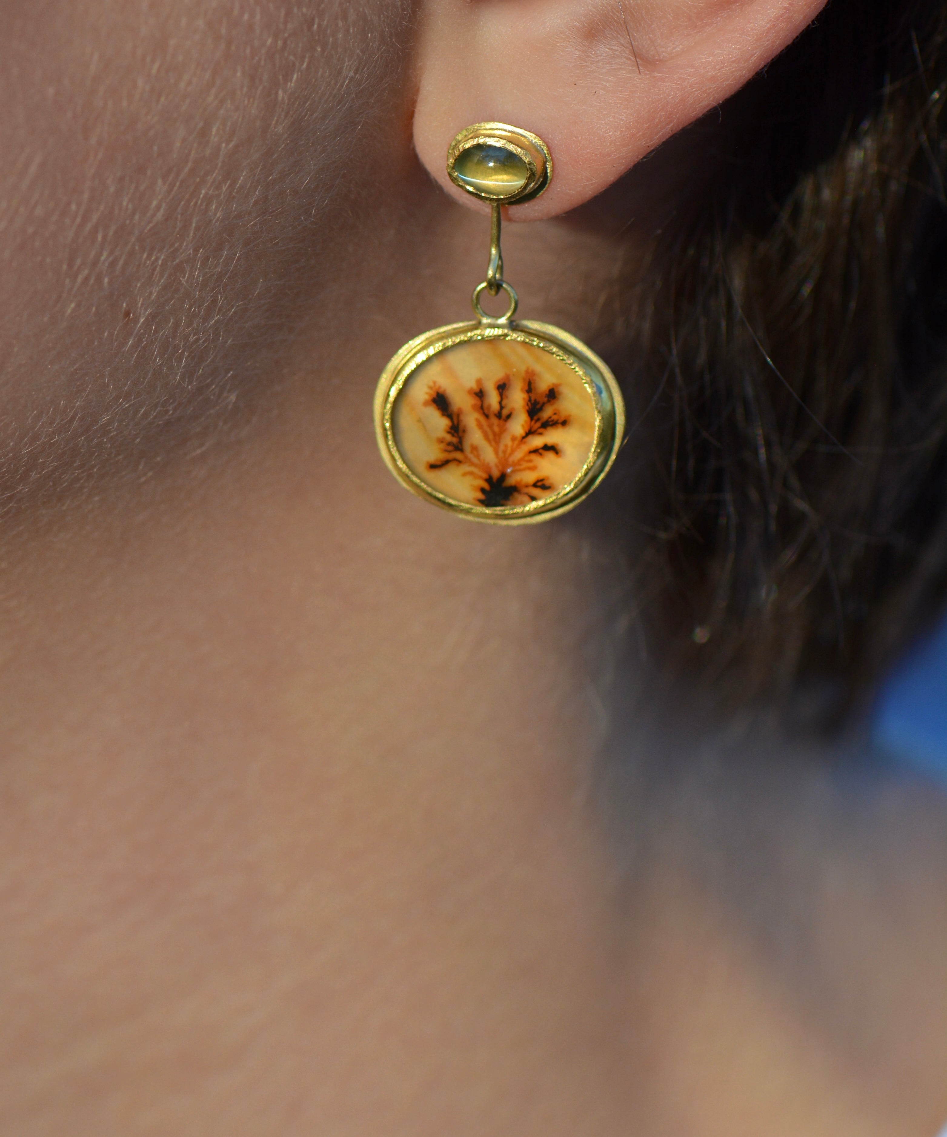 Dendritic agate & chrysoberyl oval drop earring on model