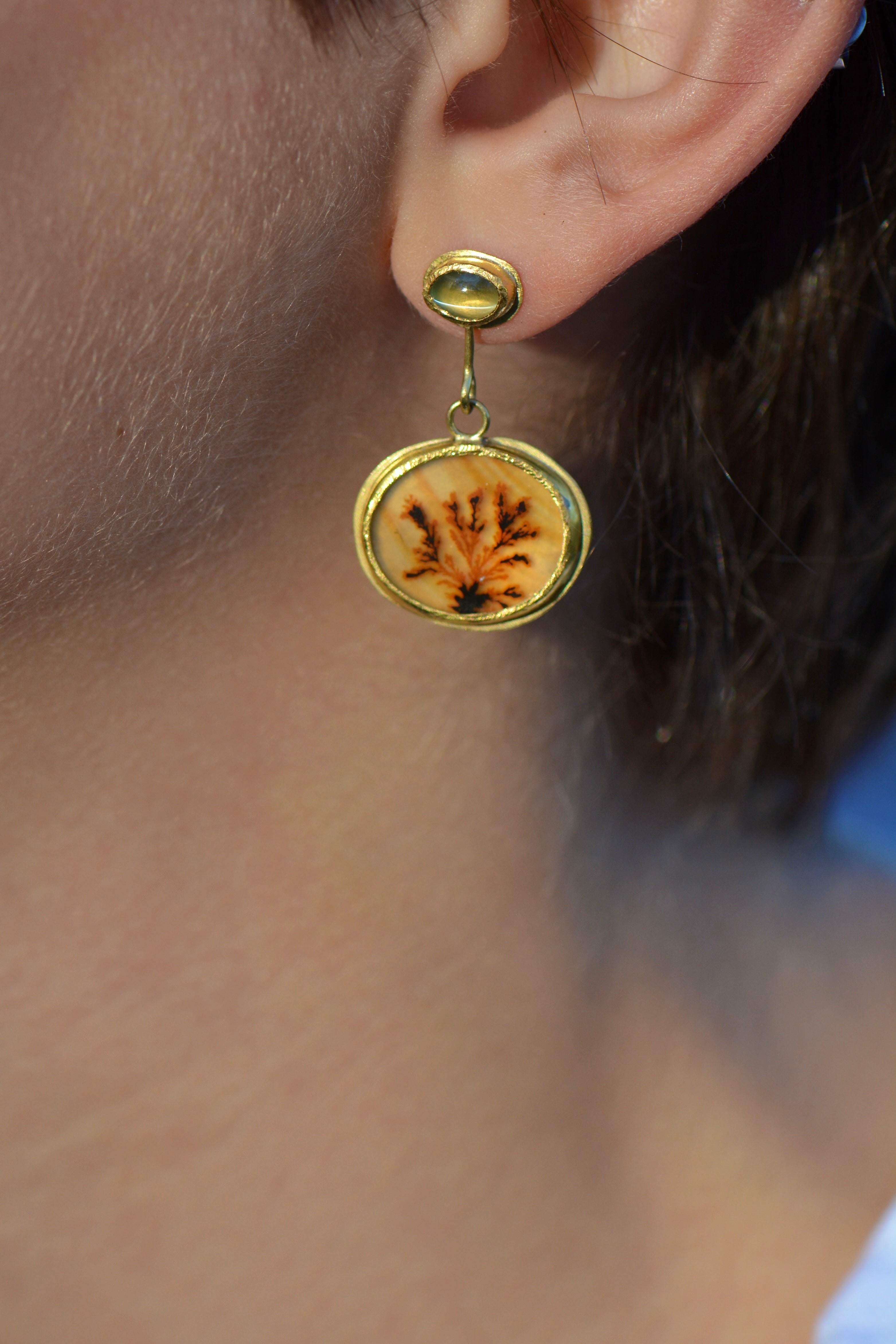 Dendritic agate & chrysoberyl oval drop earring on model