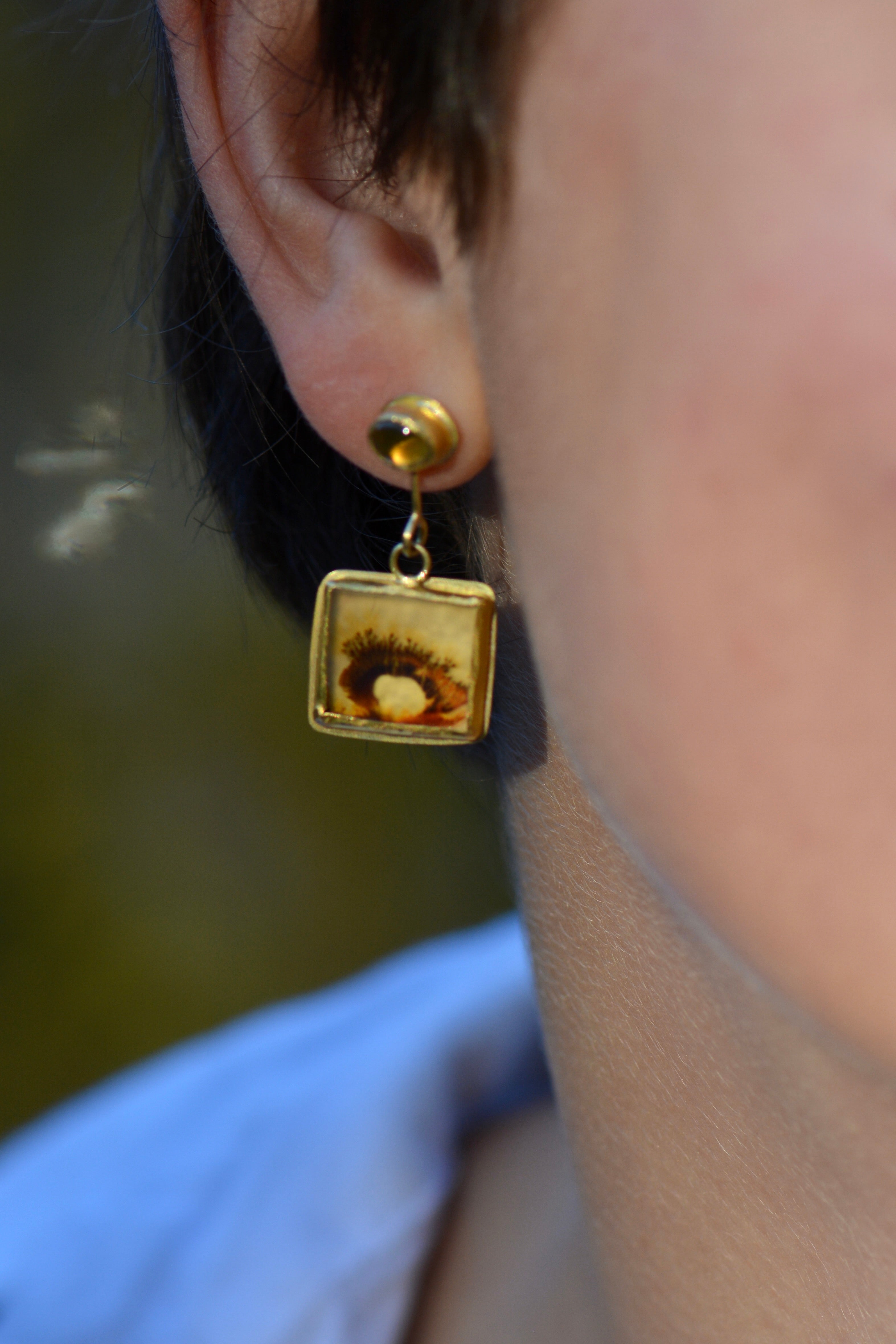 Dendritic agate and chrysoberyl rectangular earring on model